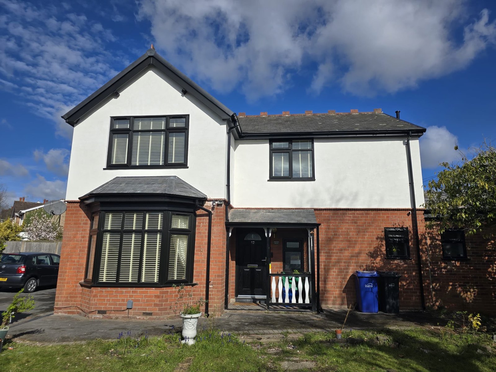 Side elevation after a smooth white render finish
